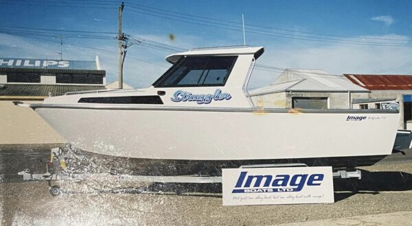 Image Boats NZ Struggler boat on display at shop