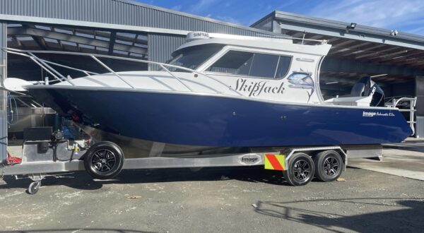 Image Boats New Zealand Skipjack boat on trailer