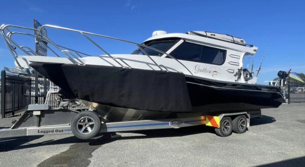 Image Boats NZ 8.5m Fishmaster Gratitude parked on trailer