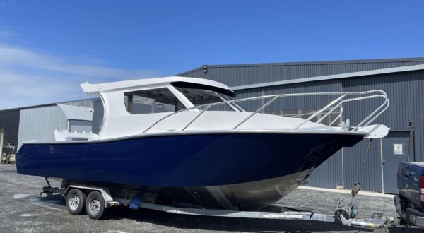 Image Boats NZ 10m CruiseMaster on trailer at workshop