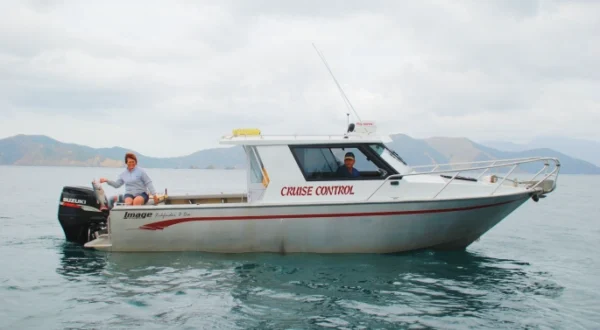 Image Boats NZ couple on boat at sea